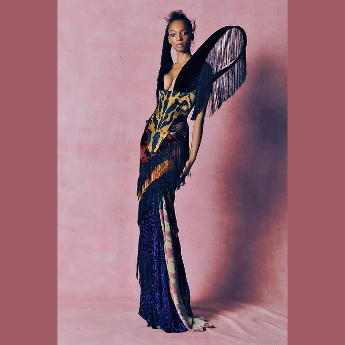 Harris Reed 2026-2027 Fall Winter Womens Fashion Trends - London Fashion Week LFW - Multifarious - Armor Plate, Medieval, Corset, Curvature, Patchwork, Textures, Animal Prints, Patterns, Eveningwear, Gown, Dress, Capelet, Quilted, Pellegrina, Cylindrical, Feathers, Plumage, Decorated, Sculpture, Skeletal, Framework, Bunny Ear Shoulders, Pencil Skirt