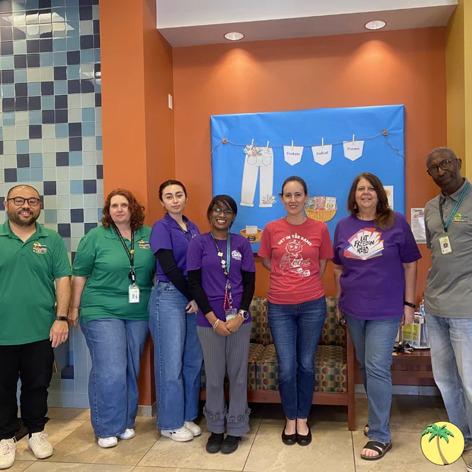 West Boca branch library staff in library shirts.