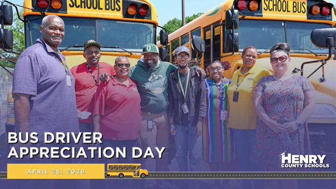 April 28th is Bus Driver Appreciation Day. HCS bus drivers pose in front of buses.