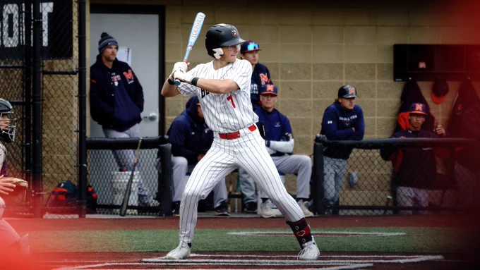 Kyle Carlberg waits for a pitch against Macalester.