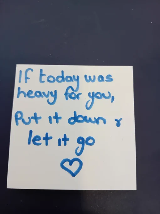 Handwritten on a post it note: If today was heavy for you, put it down and let it go. Handwritten on  post it note. 
