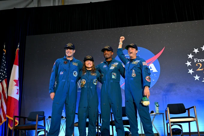 NASA\u2019s Artemis II crew, NASA astronauts Reid Wiseman, commander; Victor Glover, pilot; Christina Koch, mission specialist; and CSA (Canadian Space Agency) astronaut Jeremy Hansen, shared brief remarks with friends, family, and colleagues after they landed at Ellington Airport near NASA\u2019s Johnson Space Center in Houston on Saturday, April 11, 2026, after a nearly 10-day journey around the Moon and back to Earth. Credit: NASA/Helen Arase Vargas