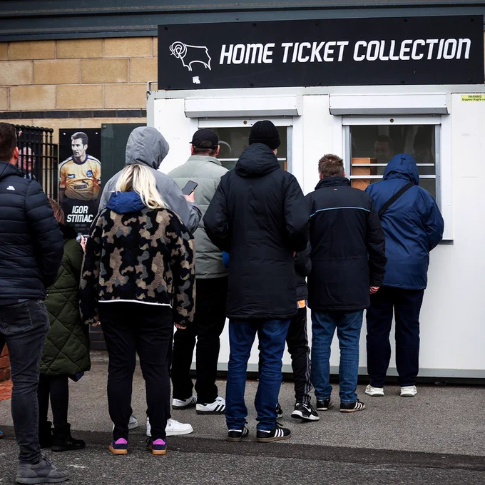 An image of fans queuing for tickets at Pride Park Stadium.