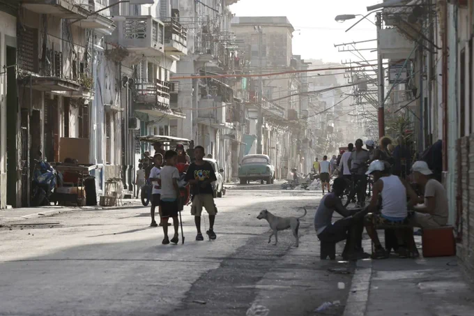 Children walk down a street in Havana, Cuba, 09 April 2026 (EPA / Ernesto Mastrascusa)