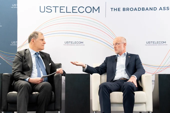 Image of USTelecom President and CEO Jonathan Spalter and FCC Chairman Brendan Carr speaking at USTelecom's American Connectivity Forum