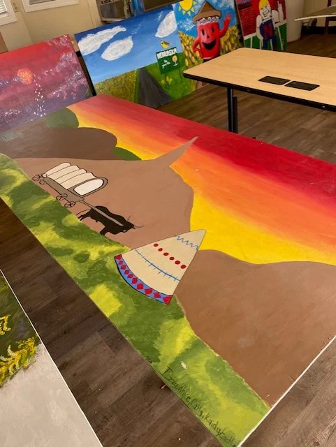 Completed murals drying before being installed at Kids Kingdom