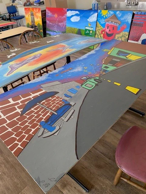 Completed murals drying before being installed at Kids Kingdom