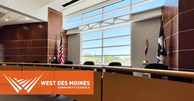 Photo of the WDMCS Board table with the WDMCS logo.