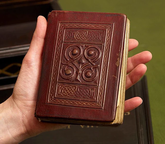 The leather-bound St Cuthbert Gospel.