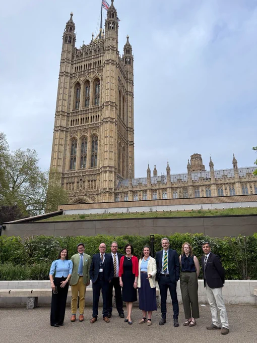 9 colleagues from the Centre for Rural Economy standing in front of the Houses of Parliament in London