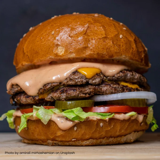 Image of a beef burger. Photo by amirali mirhashemian on Unsplash.