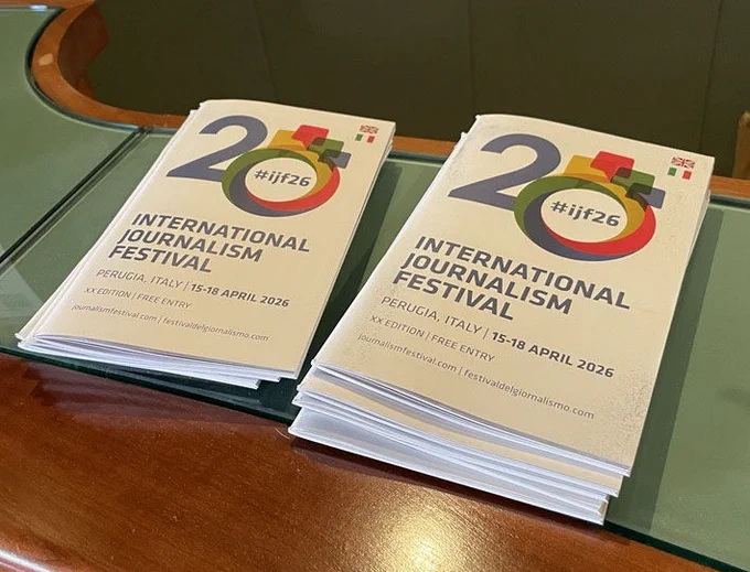 A close-up photo of a stack of booklets at the International Journalism Festival.