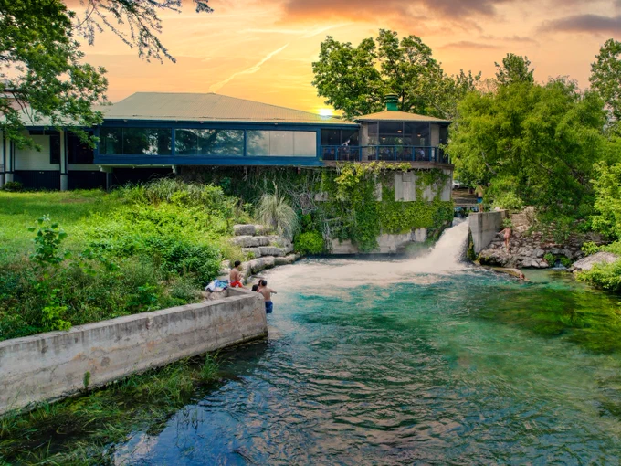 Kerbey Lane Cafe San Marcos overlooking San Marcos river foundation supporting community river and cleaning green space 