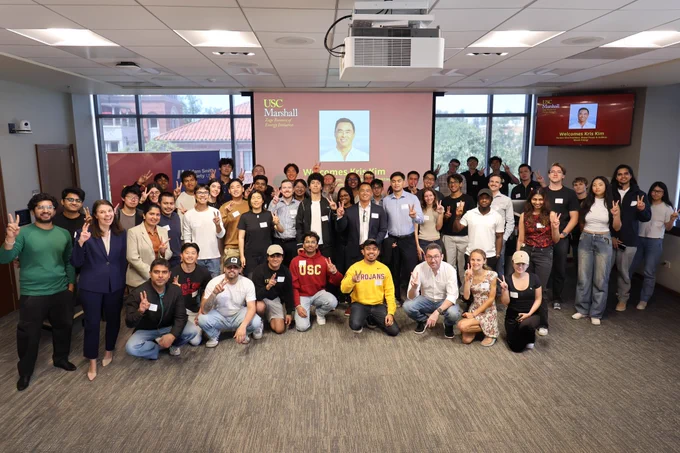 Kris Kim with a group of USC students