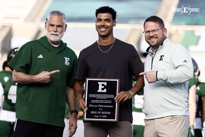 Dylan Drummond accepts his Ring of Honor plaque from Athletic Director Scott Wetherbee and Head Coach Chris Creighton