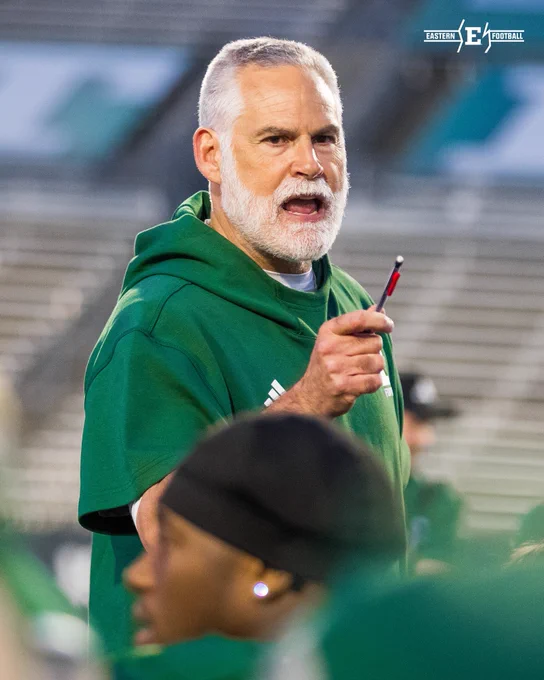 Coach Creighton speaks to the team