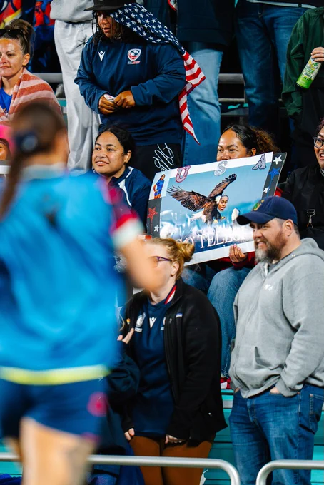 Fans holding a USA poster