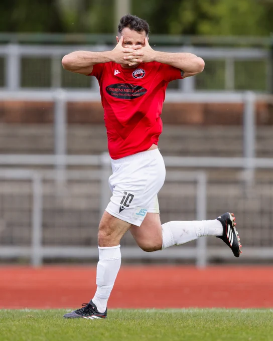Luke Bowen celebrates scoring for Trefelin against Newport City. 