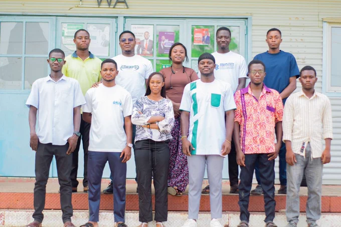 The image shows a group picture of the UBIDS YouthMappers after the April 11 First General Meeting 2026.