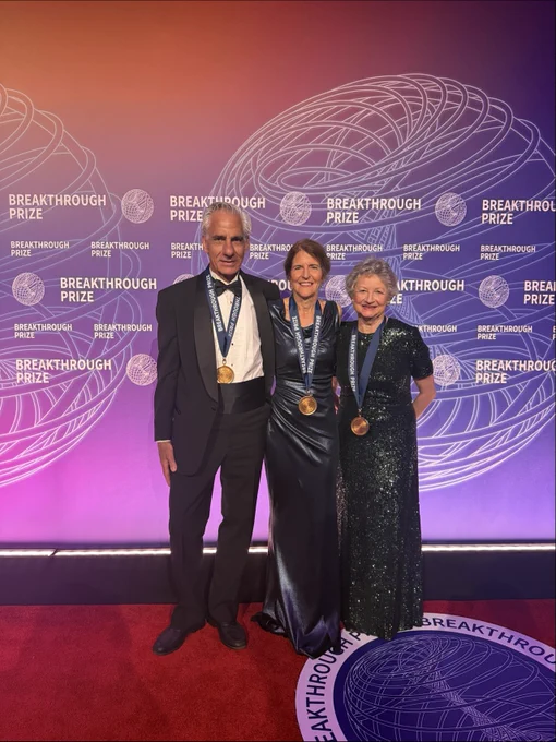 Jean Bennett, MD, PhD, Albert Maguire, MD, and Katherine High, MD, posing on the Breakthrough Prize red carpet
