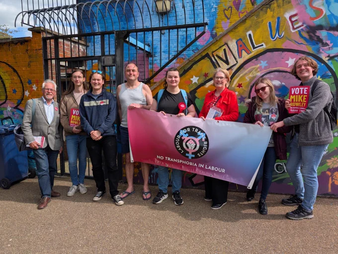 LfTR campaign day in Oxford. Activists stand with LfTR banner.