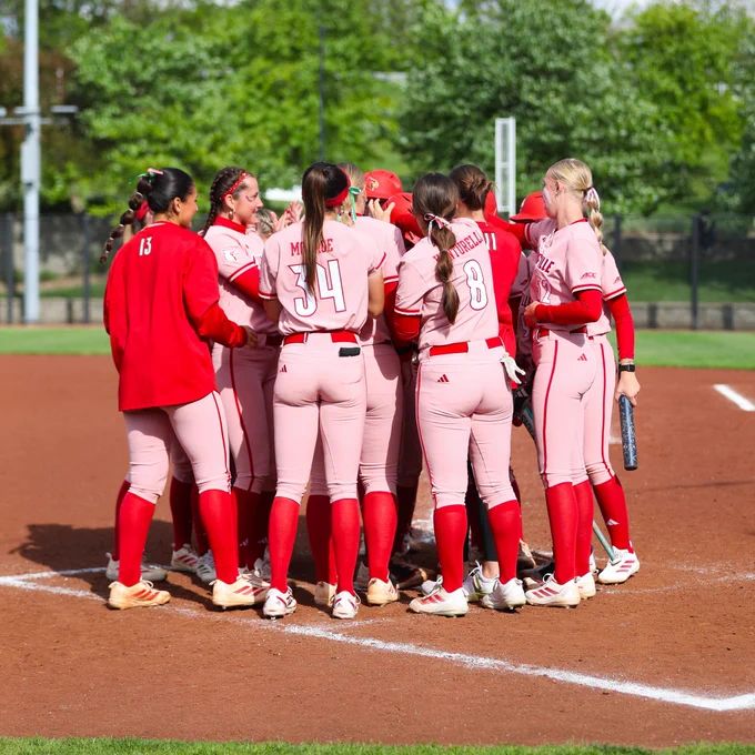 Louisville softball huddle shot post-win over Pitt.