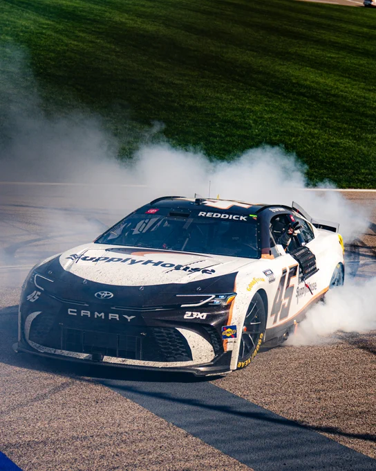 Tyler Reddick does a burnout in Kansas.