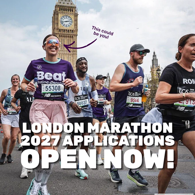 Photo of a young white woman smiling, running alongside other people on the road. Behind the runners is Big Ben, a long stone tower with a large clockface on top. The woman is smiling wide, and wears reflective sunglasses, a purple Beat-branded t-shirt, and pink running shorts. An illustrated purple arrow points to the woman with text reading 'This could be you!' Large capitalised white text at the bottom of the photo reads 'London Marathon 2027 applications open now!'