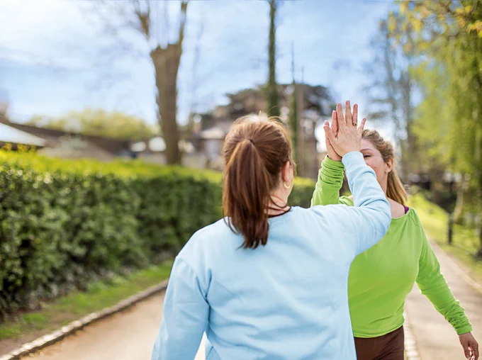 two women running 