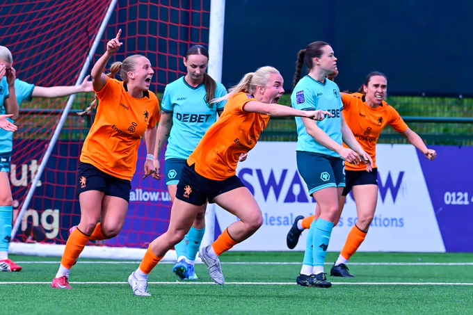 Rugby Borough Women celebrate their goal.