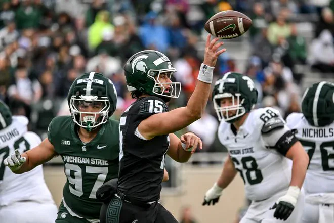 Class of 2025 QB, Leo Hannan, attempts a pass at the Michigan State Spring Showcase on 4/18/2026. Photo by Nick King/Lansing State Journal.