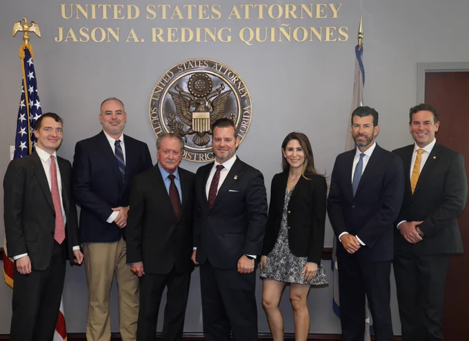 U.S. Attorney Jason A. Reding Quiñones alongside Joe diGenova and the executive team.