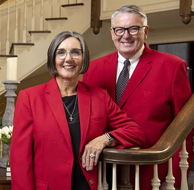 A smiling headshot of couple, Dr. Rick L. James and Dr. Vicki L. James.