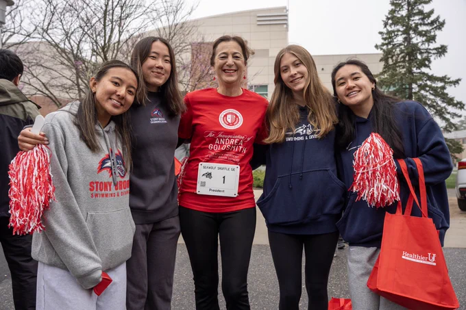 I am standing with Stony Brook Community members at the 5k run/walk on campus.