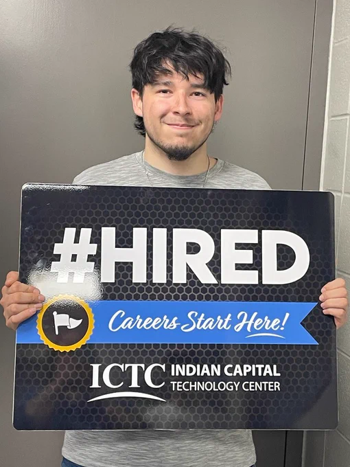 A person holds a sign that reads "HIRED Careers Start Here!" with "ICTC INDIAN CAPITAL TECHNOLOGY CENTER" below.