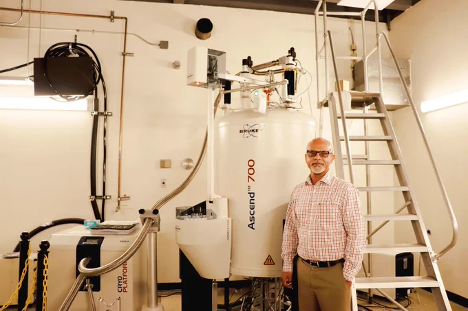 Dr. Thomas Weldeghiorghis with the Bruker AVANCE Neo 700 MHz NMR Spectrometer. The system is equipped with a cryoprobe for solution-state NMR and both 3.2 mm and 0.7 mm Magic Angle Spinning (MAS) probes for solid-state NMR experiments.

– Photo Credit: Anna Slaton