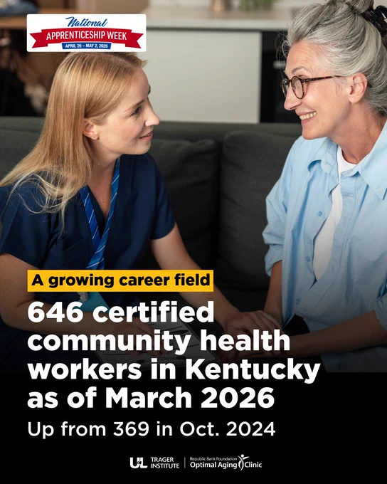 A young female health professional extending a comforting hand to an older female client.