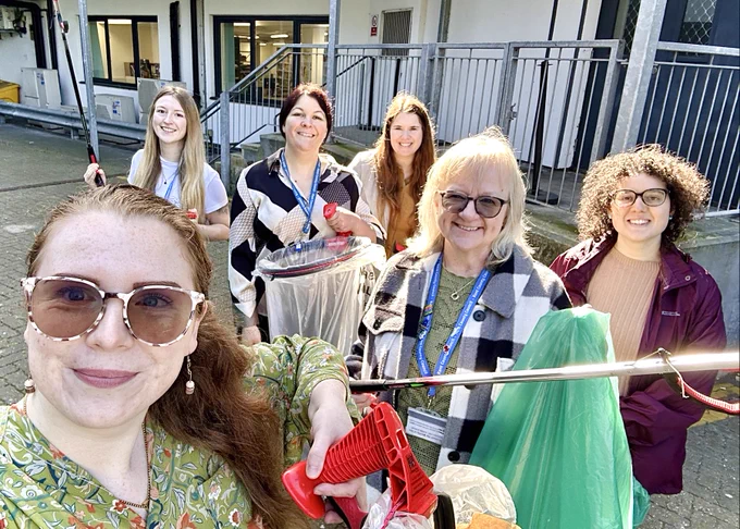 Shown here is a photograph of (from left) Georgia, Jodie, Abigail, Millie, Sheelagh and Alice from the Kent Libraries and Archives teams, collecting litter in the vicinity of Kent History and Library Centre, Maidstone.