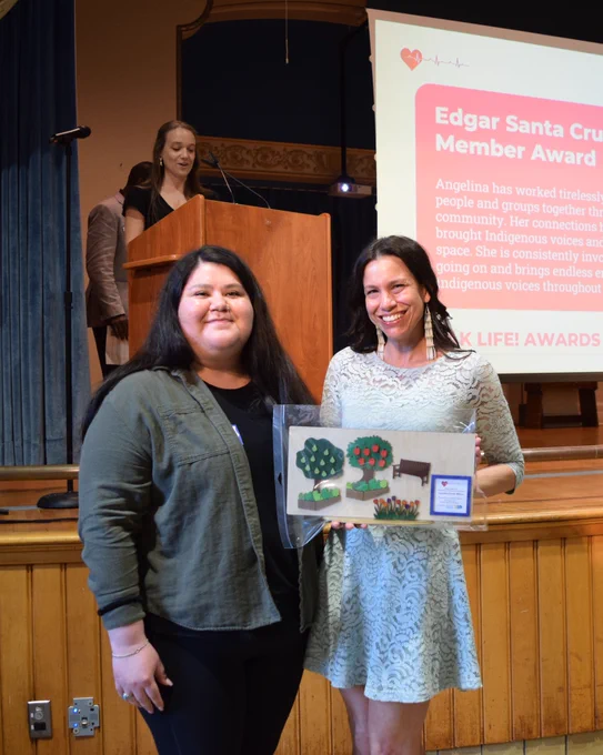 Angelina Hilton of the Indigenous Health Coalition receiving the Edgar Santa Cruz Outstanding Coalition Member Award. 
