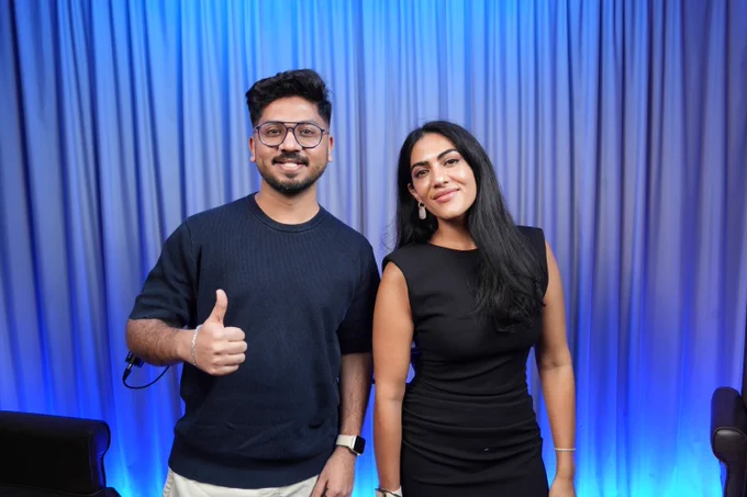 Yax Sheth sitting with Nisheta Sachdeva, CMO of Rider Wallet, on the YaxVaani podcast set in Dubai. Episode cover featuring the guest's name and YaxVaani branding.
