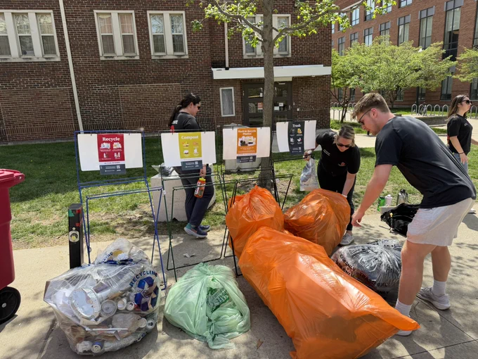 Volunteers collecting sorted waste.
