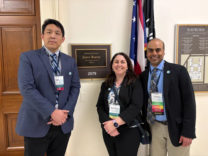 Ma, Swindle-Reilly, and Ghadiali standing outside of Joyce Beatty's office