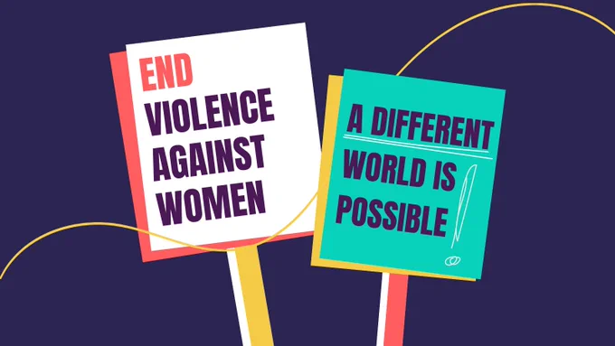 Two placards that read: End violence against women; a different world is possible!