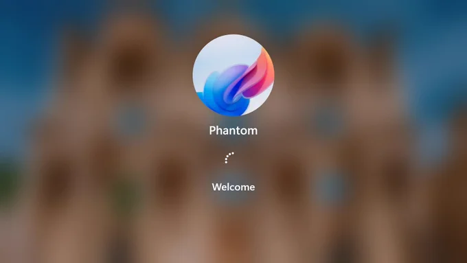 Windows 11 login screen, with Windows 8-style spinning dots between the username ("Phantom") and the "Welcome" text.