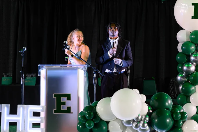 Caleb Coley presents an award at the 2026 Ypsi’s