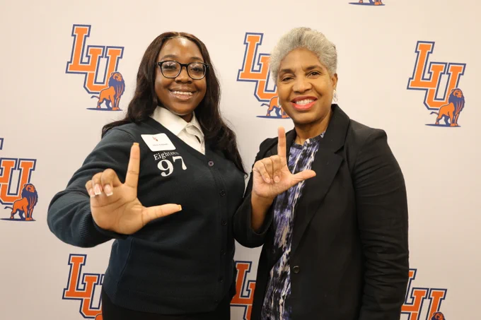 an LU student with Senator Regina Goodwin