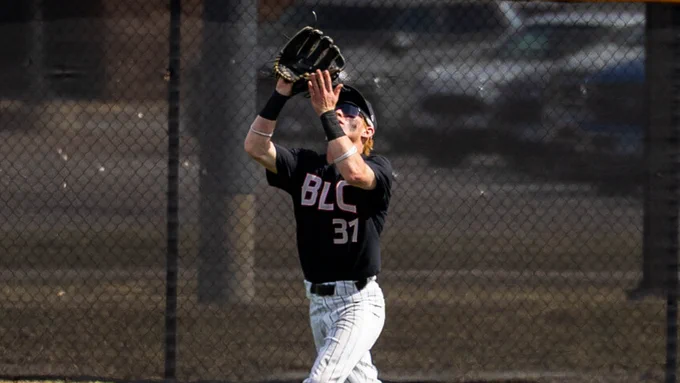 Jayden Knutson catches a fly ball in center field.