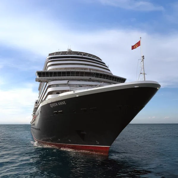 The Cunard Liner, Queen Anne, sailing on the seas. 