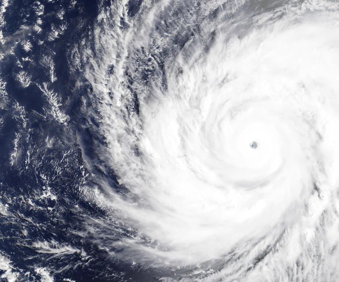 Satellite image of Super Typhoon Sinlaku over the western Pacific as it approached the Northern Mariana Islands on April 13, 2026. At maximum intensity, the storm packed winds of 175 mph (280 kph), making it the equivalent of a Category 5 storm on the Saffir-Simpson Hurricane Wind Scale. Image credit: MODIS Land Rapid Response Team, NASA GSFC