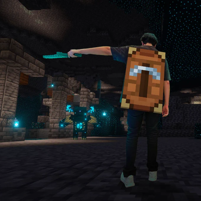 Person in Minecraft cape holding out a sword